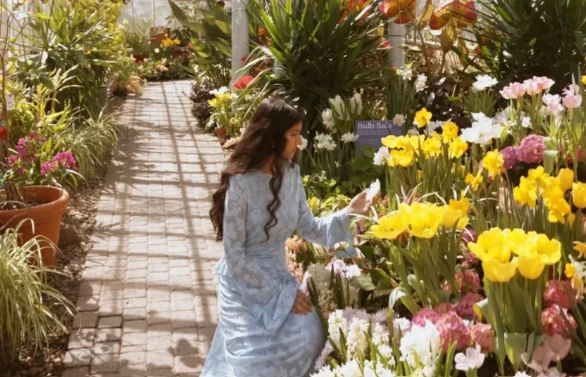 Rafa among greenhouse flowers