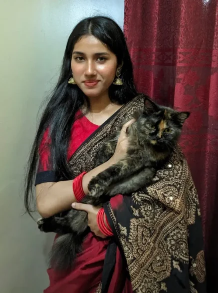 Rafa holding a cat